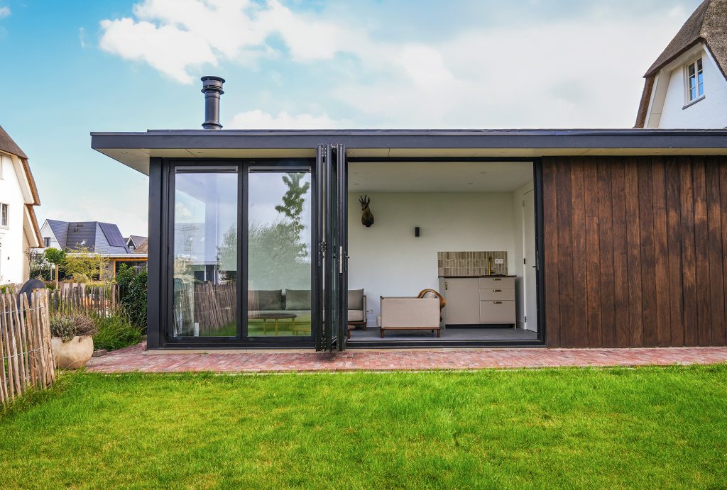 Tuinkamer met glazen vouwwand